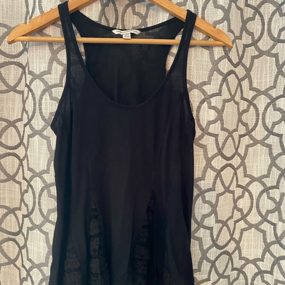 Lace detail tank. Good condition, worn.